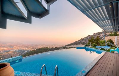 pexels-photo-221457-221457 Infinity pool with breathtaking mountain and city views, perfect for a luxury tropical getaway.